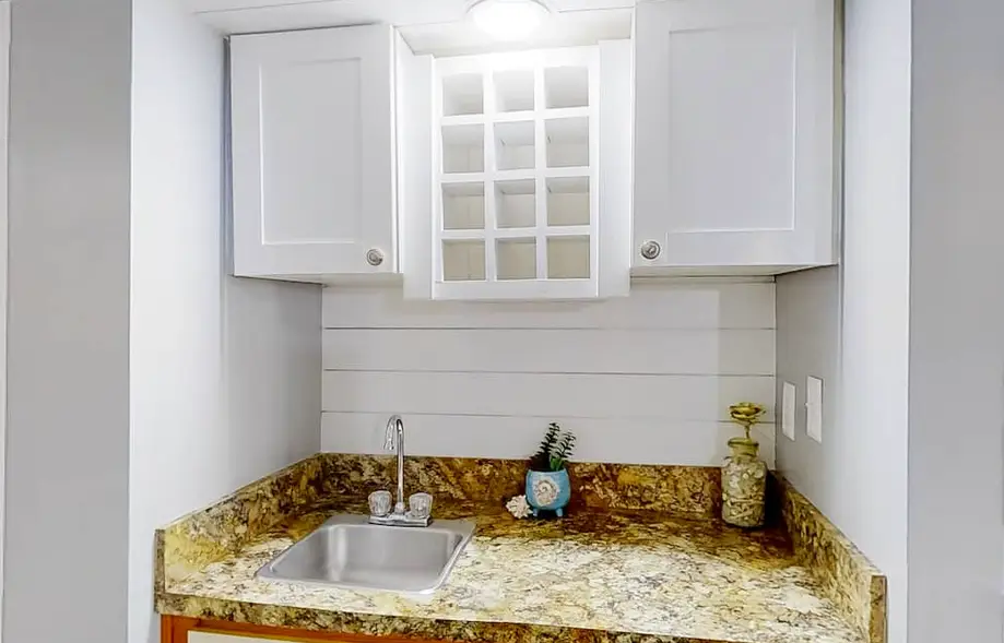 Refreshing lake view condo with pool, hot tub, patio, tennis court, & kitchen