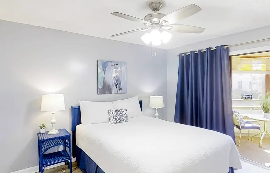 Refreshing lake view condo with pool, hot tub, patio, tennis court, & kitchen
